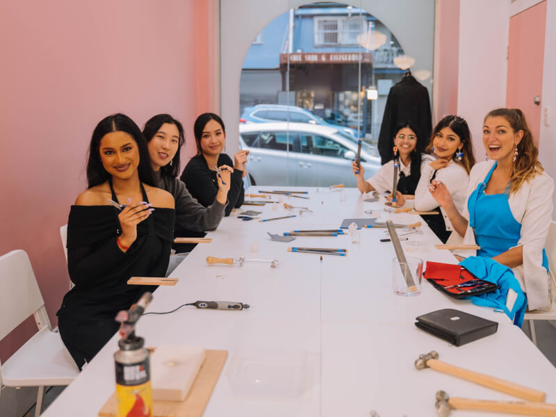 A group of women at a jewellery making class